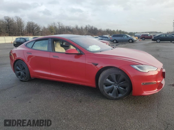 2022 Tesla Model S Plaid with VIN 5YJSA1E61NF488716, listed as a Copart auction lot 45325785 with Not provided miles and Salvage title. Bid and sale history available at DreamBid. Image 4.