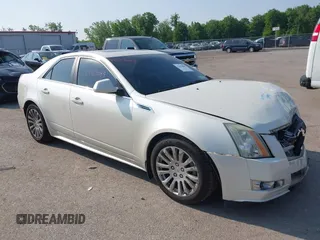 2010 Cadillac CTS z VIN 1G6DM5EG0A0144418, wystawiony jako IAAI lot #42413085 z przebiegiem 168 444 mil mil oraz . Historia ofert i sprzedaży dostępna na DreamBid. Obrazek 1.