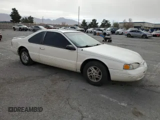 1997 Ford Thunderbird LX with VIN 1FALP62W5VH124101, listed as a Copart auction lot 47547695 with 148,828 mi miles and Salvage Title. Bid and sale history available at carsss.com. Image 4.