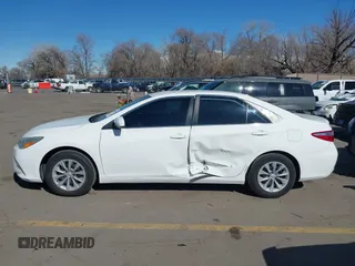 2015 Toyota Camry XLE with VIN 4T4BF1FK7FR465495, listed as a IAAI auction lot 41684622 with 126,543 mi miles and . Bid and sale history available at carsss.com. Image 13.
