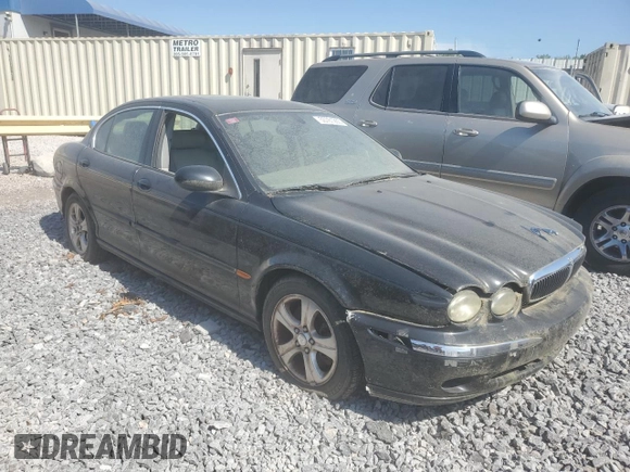 2002 Jaguar X-Type z VIN SAJEA51C02WC53526, wystawiony jako Copart lot #53761265 z przebiegiem 156 584 mil mil oraz Czysty tytuł • Clean title. Historia ofert i sprzedaży dostępna na DreamBid. Obrazek 4.