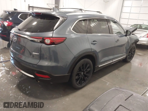 2022 Mazda CX-9 Grand Touring with VIN JM3TCBDY3N0619674, listed as a IAAI auction lot 41609191 with 32,722 mi miles and . Bid and sale history available at carsss.com. Image 4.