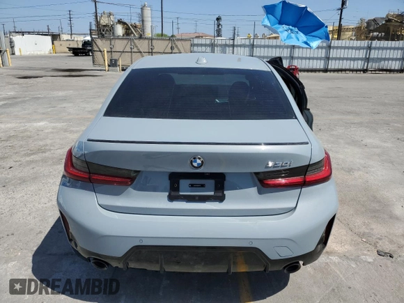 2023 BMW 3 Series 330i with VIN 3MW69FF00P8D52700, listed as a Copart auction lot 61629485 with 12,007 mi miles and Salvage title. Bid and sale history available at DreamBid. Image 6.