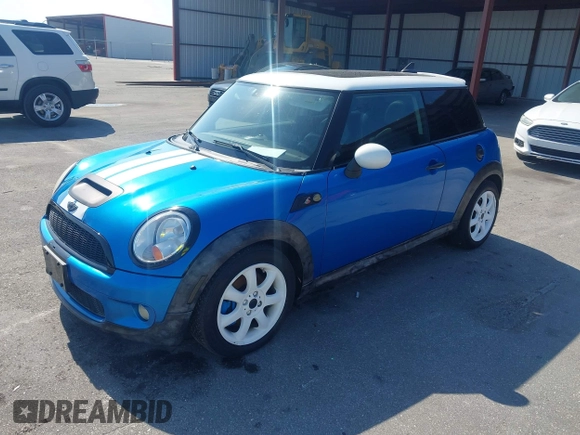 2009 MINI Hardtop S with VIN WMWMF73539TT95350, listed as a IAAI auction lot 42196663 with 75,593 mi miles and . Bid and sale history available at DreamBid. Image 2.