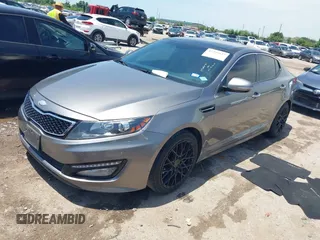 2013 Kia Optima SX with VIN 5XXGR4A67DG199714, listed as a IAAI auction lot 42359527 with 133,636 mi miles and . Bid and sale history available at DreamBid. Image 2.