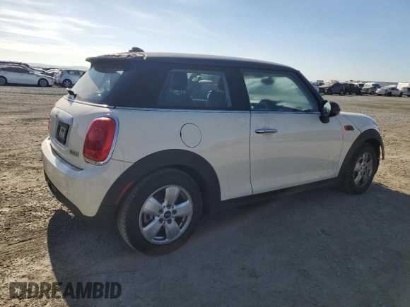2014 MINI Hardtop with VIN WMWXM5C54ET934110, listed as a Copart auction lot 85128094 with 89,020 mi miles and Salvage Title. Bid and sale history available at DreamBid. Image 3.