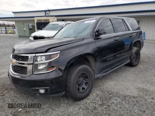 2016 Chevrolet Tahoe Commercial with VIN 1GNLCDEC1GR291328, listed as a Copart auction lot 87735875 with 113,746 mi miles and Salvage title. Bid and sale history available at DreamBid. Image 1.