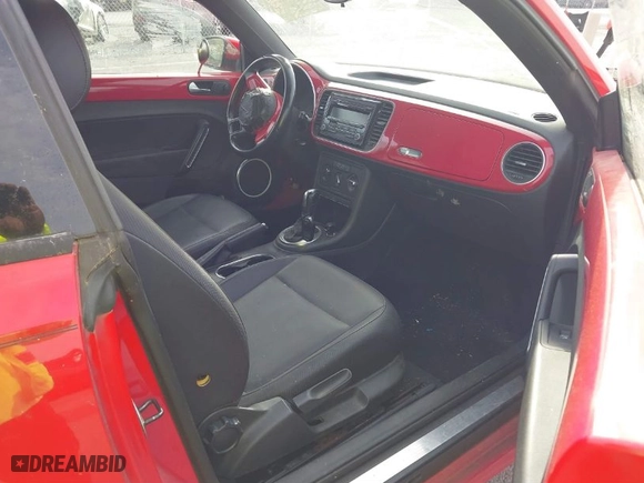 2012 Volkswagen Beetle 2.5L PZEV with VIN 3VWJP7AT0CM641164, listed as a IAAI auction lot 40698387 with 113,200 mi miles. Bid and sale history available at carsss.com. Image 5.