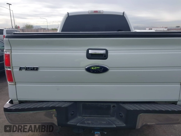 2013 Ford F-150 XL with VIN 1FTFW1ET7DKD70468, listed as a IAAI auction lot 40952588 with 208,052 mi miles. Bid and sale history available at carsss.com. Image 16.