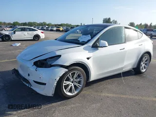 2021 Tesla Model Y Standard Range with VIN 5YJYGDED3MF103650, listed as a IAAI auction lot 41726278 with Not Provided miles and . Bid and sale history available at DreamBid. Image 21.