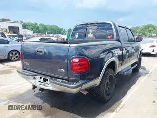 2001 Ford F-150 XLT z VIN 1FTRW08LX1KD56482, wystawiony jako IAAI lot #42155153 z przebiegiem 340 009 mil mil oraz . Historia ofert i sprzedaży dostępna na DreamBid. Obrazek 4.