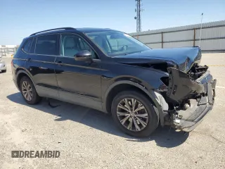 2018 Volkswagen Tiguan S with VIN 3VV1B7AXXJM069099, listed as a Copart auction lot 52345235 with 79,359 mi miles and Salvage title. Bid and sale history available at DreamBid. Image 4.