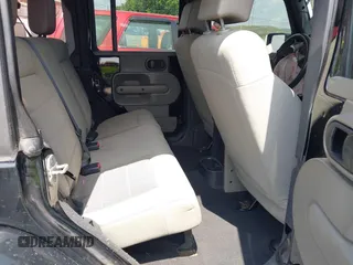 2008 Jeep Wrangler Unlimited Sahara with VIN 1J4GA59128L608515, listed as a IAAI auction lot 42627584 with 157,821 mi miles and . Bid and sale history available at DreamBid. Image 8.