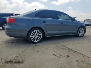2014 Volkswagen Jetta TDI w/Premium/Nav with VIN 3VWLL7AJ7EM385112, listed as a Copart auction lot 58063295 with 169,683 mi miles and Salvage title. Bid and sale history available at DreamBid. Image 3.