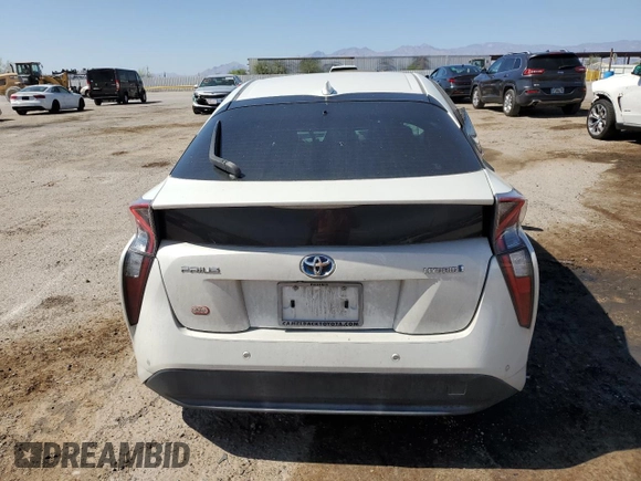 2018 Toyota Prius Two z VIN JTDKARFU0J3054693, wystawiony jako Copart lot #57581855 z przebiegiem 51 684 mil mil oraz Szkoda całkowita • Salvage title. Historia ofert i sprzedaży dostępna na DreamBid. Obrazek 6.