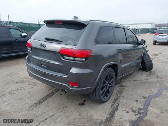 2018 Jeep Grand Cherokee Laredo E with VIN 1C4RJFAG4JC464783, listed as a IAAI auction lot 41664453 with 106,466 mi miles. Bid and sale history available at carsss.com. Image 4.