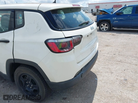 2018 Jeep Compass Sport with VIN 3C4NJCAB3JT263298, listed as a IAAI auction lot 42218194 with 104,604 mi miles and . Bid and sale history available at DreamBid. Image 6.