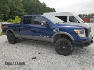 2016 Nissan Titan XD PRO-4X with VIN 1N6BA1F41GN511765, listed as a Copart auction lot 60913014 with 145,365 mi miles and Clean Title. Bid and sale history available at carsss.com. Image 4.