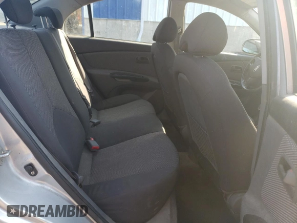 2011 Kia Rio with VIN KNADH4B32B6915275, listed as a Copart auction lot 71546484 with 297,998 mi miles and Salvage Title. Bid and sale history available at DreamBid. Image 10.