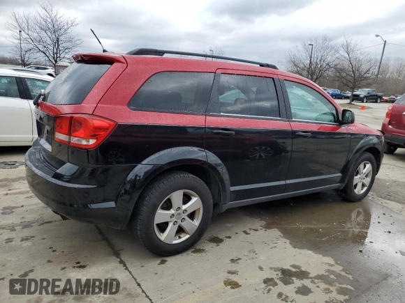 2013 Dodge Journey SE with VIN 3C4PDCAB3DT723547, listed as a Copart auction lot 48140495 with 159,979 mi miles and Salvage title. Bid and sale history available at DreamBid. Image 3.