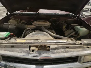1995 Chevrolet Tahoe z VIN 1GNEK13KXSJ427631, wystawiony jako Copart lot #52624475 z przebiegiem 228 492 mil mil oraz Nie do naprawy. Historia ofert i sprzedaży dostępna na DreamBid. Obrazek 12.
