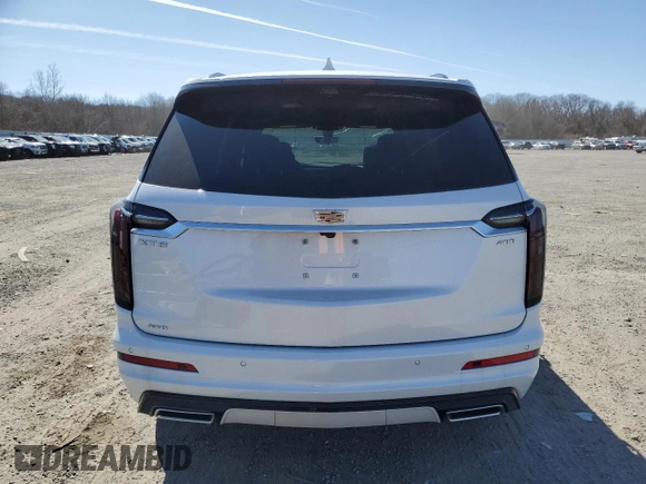 2025 Cadillac XT6 AWD Sport z VIN 1GYKPHRS5SZ101521, wystawiony jako Copart lot #48552185 z przebiegiem 262 mil mil oraz Szkody całkowita. Historia ofert i sprzedaży dostępna na DreamBid. Obrazek 6.