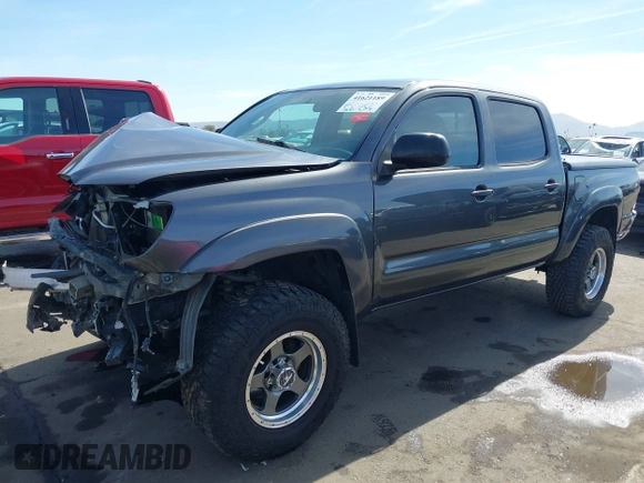 2014 Toyota Tacoma with VIN 3TMLU4EN0EM145573, listed as a IAAI auction lot 41621189 with 178,281 mi miles. Bid and sale history available at carsss.com. Image 2.