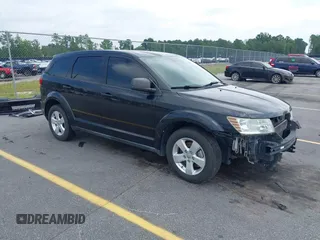 2013 Dodge Journey American Value with VIN 3C4PDCAB0DT529963, listed as a IAAI auction lot 42622001 with 168,039 mi miles and . Bid and sale history available at DreamBid. Image 1.