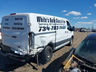 2017 Ford Transit with VIN 1FTYE1YM2HKB34459, listed as a IAAI auction lot 42059820 with 215,646 mi miles and . Bid and sale history available at DreamBid. Image 4.