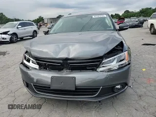 2013 Volkswagen Jetta TDI w/Premium/Nav с VIN 3VWLL7AJ4DM412457, выставлен на аукционе Copart как лот 62503225 с пробегом 91 045 миль миль и Чистый • Clean title. История ставок и продаж доступна на DreamBid. Изображение 13.