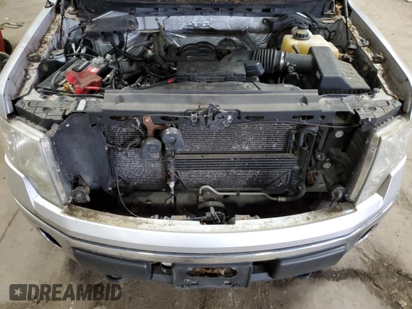 2012 Ford F-150 XL с VIN 1FTFW1EF2CKD84075, выставлен на аукционе Copart как лот 58392945 с пробегом 156 664 миль миль и Чистый • Clean title. История ставок и продаж доступна на DreamBid. Изображение 11.