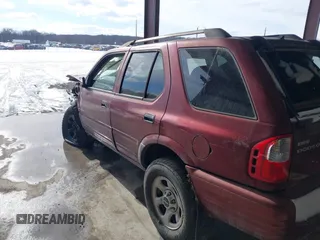 2003 Isuzu Rodeo with VIN 4S2CK58W534304195, listed as a IAAI auction lot 41354536 with Not Provided miles and . Bid and sale history available at DreamBid. Image 15.