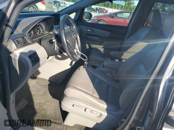 2014 Honda Odyssey Touring z VIN 5FNRL5H90EB007862, wystawiony jako Copart lot #60470005 z przebiegiem 135 686 mil mil oraz Czysty tytuł • Clean title. Historia ofert i sprzedaży dostępna na DreamBid. Obrazek 7.