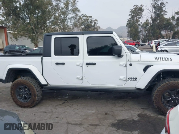 2021 Jeep Gladiator Willys с VIN 1C6HJTAG6ML619730, выставлен на аукционе IAAI как лот 41172494 с пробегом 40 360 миль миль и . История ставок и продаж доступна на DreamBid. Изображение 13.