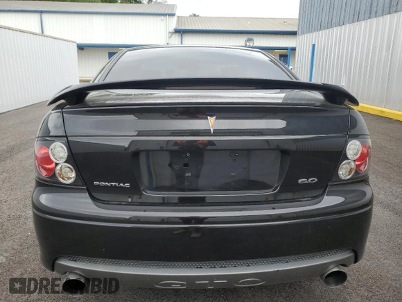2006 Pontiac GTO z VIN 6G2VX12U06L836591, wystawiony jako Copart lot #51596625 z przebiegiem 61 758 mil mil oraz Szkoda całkowita • Salvage title. Historia ofert i sprzedaży dostępna na DreamBid. Obrazek 6.