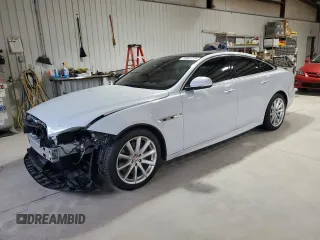 2016 Jaguar XJ R-Sport z VIN SAJWJ1CDXG8W00145, wystawiony jako Copart lot #49901234 z przebiegiem 76 629 mil mil oraz . Historia ofert i sprzedaży dostępna na DreamBid. Obrazek 1.