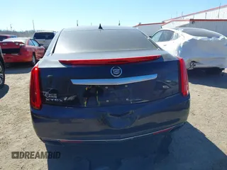 2013 Cadillac XTS Luxury z VIN 2G61R5S33D9184878, wystawiony jako IAAI lot #41644213 z przebiegiem 113 293 mil mil oraz . Historia ofert i sprzedaży dostępna na DreamBid. Obrazek 16.