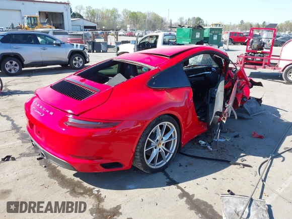 2018 Porsche 911 Carrera S with VIN WP0AB2A97JS123551, listed as a IAAI auction lot 41903716 with Not Provided miles and . Bid and sale history available at DreamBid. Image 4.