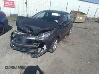 2018 Ford Fiesta SE with VIN 3FADP4EJ0JM141953, listed as a IAAI auction lot 38529613 with 74,502 mi miles and . Bid and sale history available at DreamBid. Image 2.
