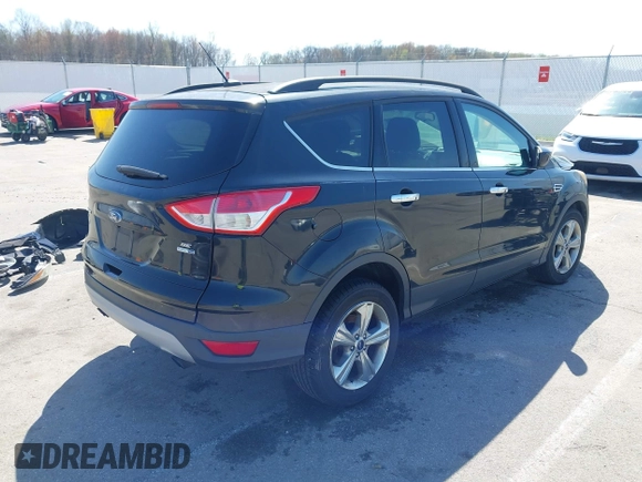 2015 Ford Escape SE with VIN 1FMCU9G9XFUC14744, listed as a IAAI auction lot 41967223 with 161,513 mi miles. Bid and sale history available at carsss.com. Image 4.