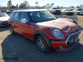 2016 MINI Cooper Clubman with VIN WMWLN5C51G2E30234, listed as a IAAI auction lot 41408299 with NaN miles. Bid and sale history available at carsss.com. Image 1.