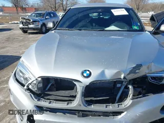 2018 BMW X6 xDrive35i with VIN 5UXKU2C50J0X51275, listed as a IAAI auction lot 41421704 with 165,052 mi miles. Bid and sale history available at carsss.com. Image 10.