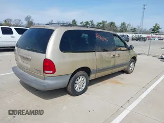 1999 Plymouth Voyager Grand SE z VIN 1P4GP44G0XB613853, wystawiony jako IAAI lot #42064199 z przebiegiem 175 050 mil mil oraz . Historia ofert i sprzedaży dostępna na DreamBid. Obrazek 4.