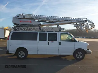 2013 Chevrolet Express Passenger LT with VIN 1GAZG1FG1D1159390, listed as a IAAI auction lot 41191409 with 176,899 mi miles and . Bid and sale history available at DreamBid. Image 12.