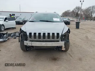2014 Jeep Cherokee Latitude with VIN 1C4PJMCS7EW220899, listed as a IAAI auction lot 41973561 with 135,572 mi miles. Bid and sale history available at carsss.com. Image 13.