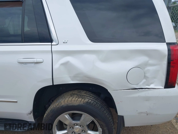 2020 Chevrolet Tahoe LT with VIN 1GNSCBKC4LR181887, listed as a IAAI auction lot 42160821 with 106,757 mi miles and . Bid and sale history available at DreamBid. Image 17.