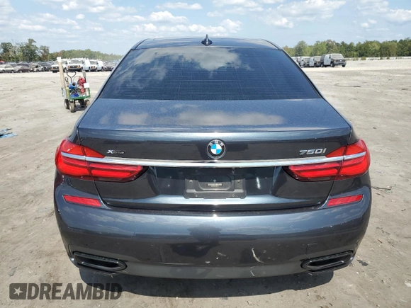 2017 BMW 7 Series with VIN WBA7F2C31HG423118, listed as a Copart auction lot 70628914 with 85,512 mi miles and Salvage Title. Bid and sale history available at DreamBid. Image 6.