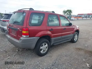 2001 Ford Escape with VIN 1FMCU01121KE83520, listed as a IAAI auction lot 42578099 with 279,085 mi miles and . Bid and sale history available at DreamBid. Image 4.