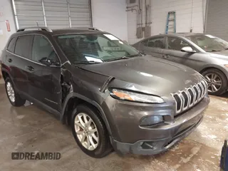 2016 Jeep Cherokee Altitude with VIN 1C4PJLCB0GW338970, listed as a IAAI auction lot 41559196 with 129,366 mi miles and . Bid and sale history available at DreamBid. Image 1.