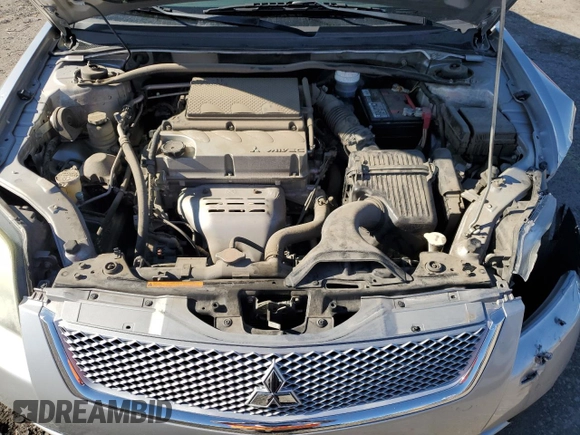 2011 Mitsubishi Galant ES z VIN 4A32B3FF3BE027602, wystawiony jako Copart lot #56150005 z przebiegiem 78 095 mil mil oraz Szkoda całkowita • Salvage title. Historia ofert i sprzedaży dostępna na DreamBid. Obrazek 11.